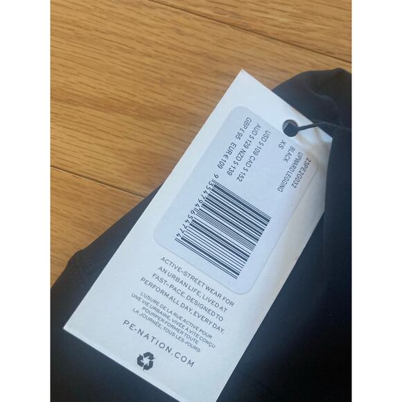 NWT P.E Nation Upward Leggings Black Orange Stripe XS Revolve - Picture 8 of 9